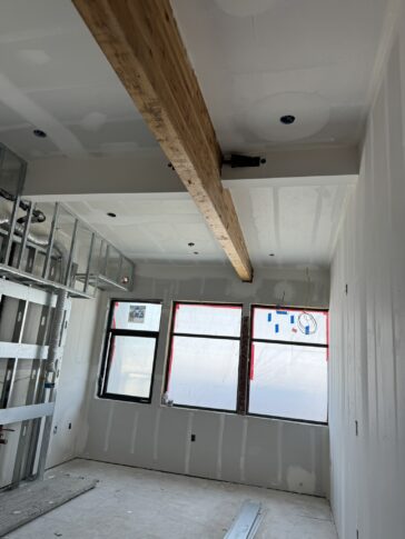 adaptive re-use, office conversion, 3301 Kerner, under construction, drywall uncovered beam<br /><small></small>