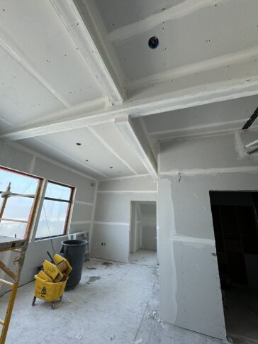 adaptive re-use, office conversion, 3301 Kerner, under construction, drywall covered beams<br /><small></small>