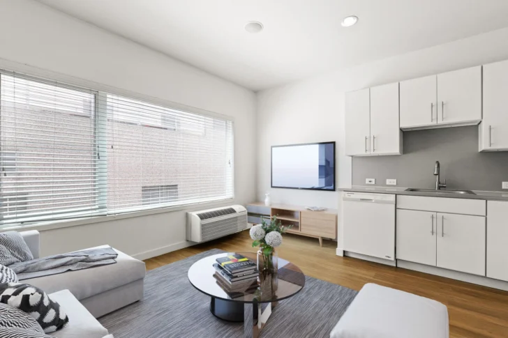 Eliot Flats Modular Housing living room VMWP<br /><small>Image: cornerstoneapartments.com</small>